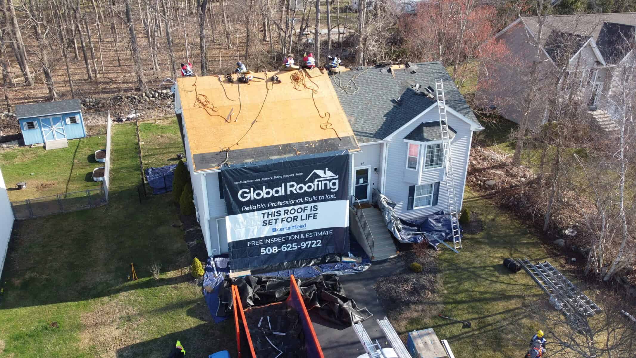 Roof replacement in progress — new shingles being installed