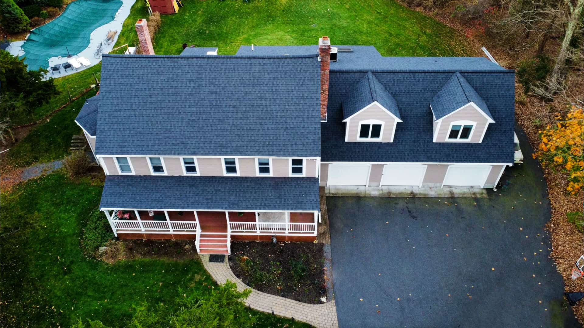 Solar panels and roofing installed under one roof