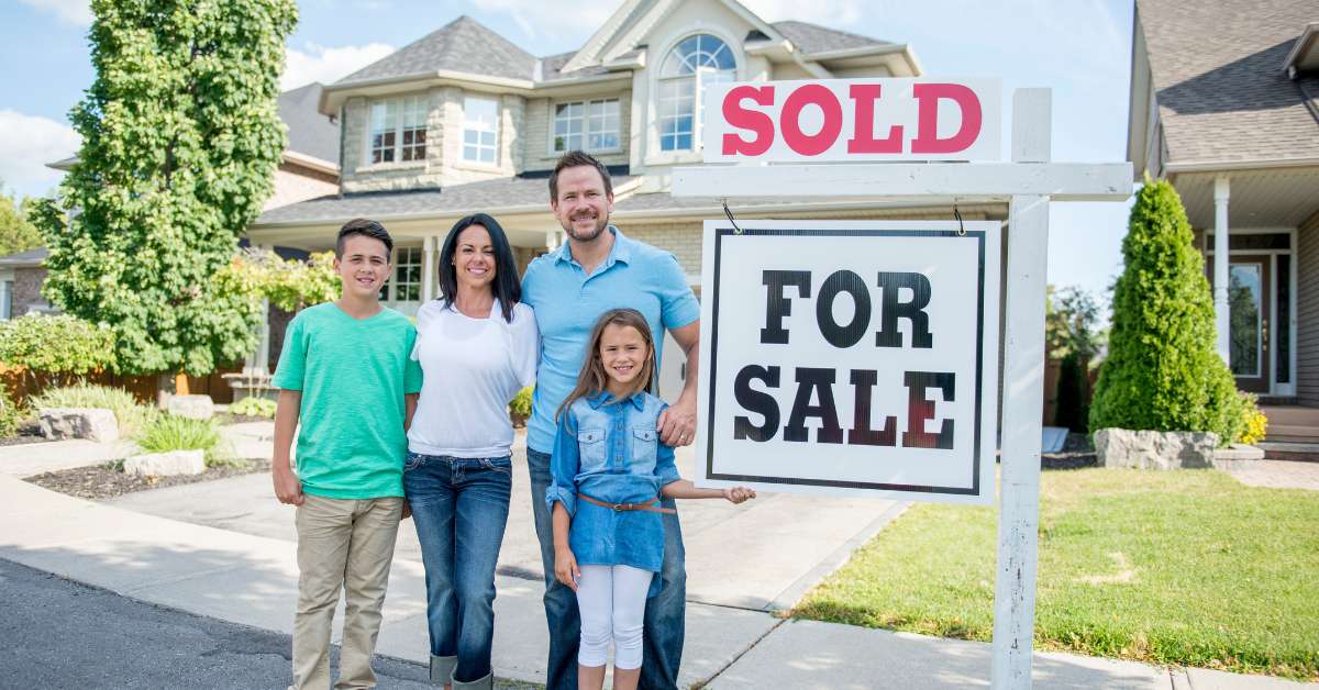 Family after buying a home with solar panels in Massachusetts